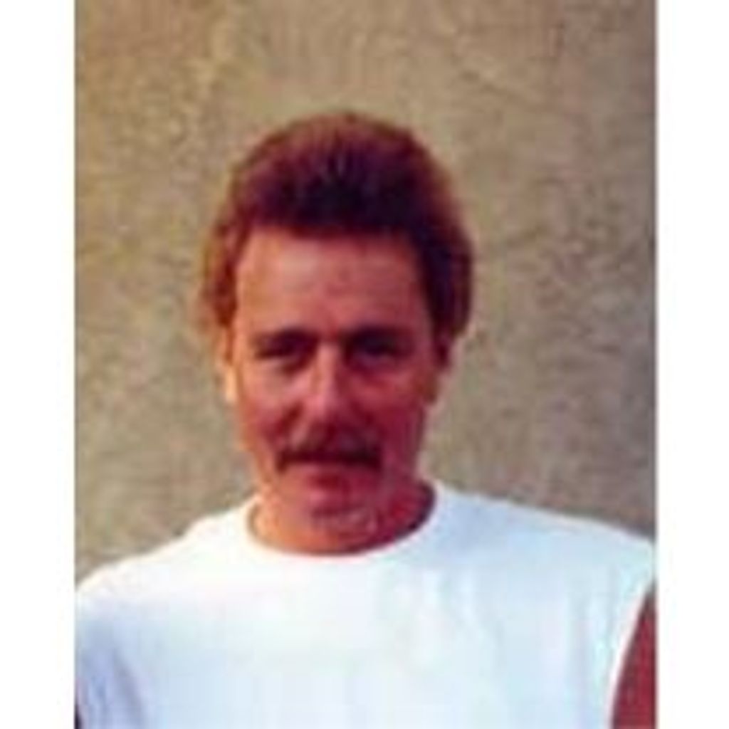 Ken L. Miller