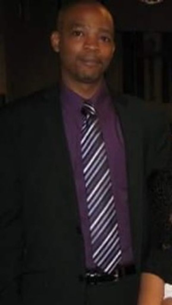 Travis L. Rogers