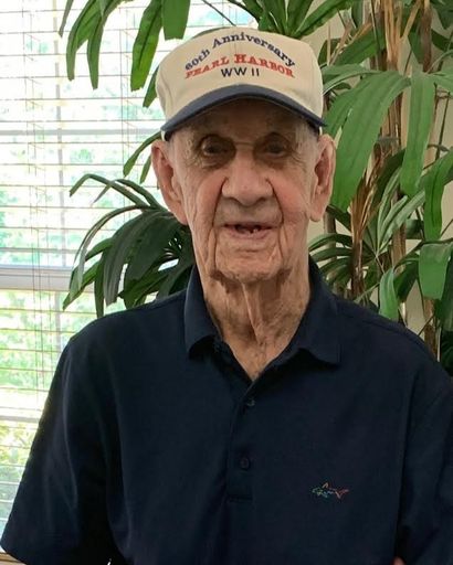 George E. Miller's obituary image