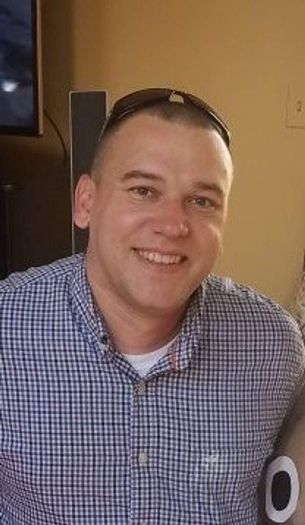 Adam  W. Vencis