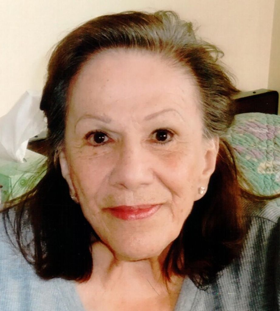 Marie (Vela)  Wilson