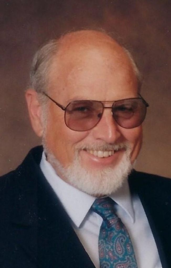 Wayne E. “Bud" Miller