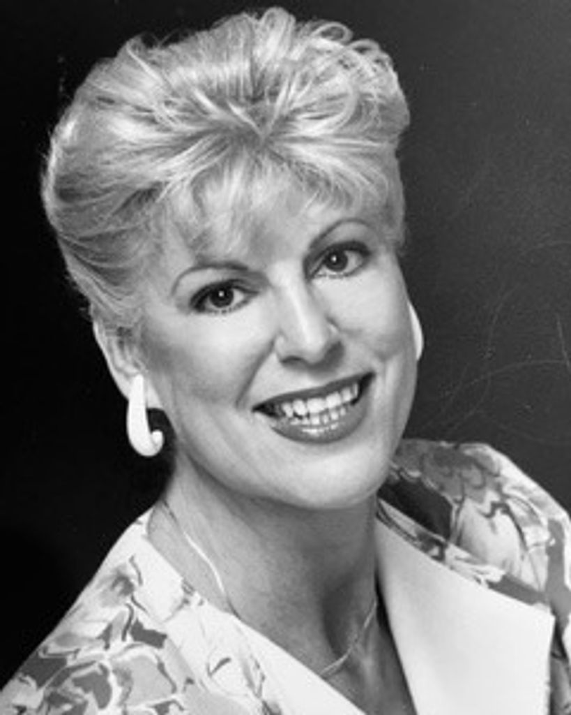 Gloria E. Raye