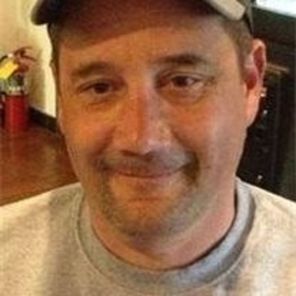 Russell F. "Russ" Huther