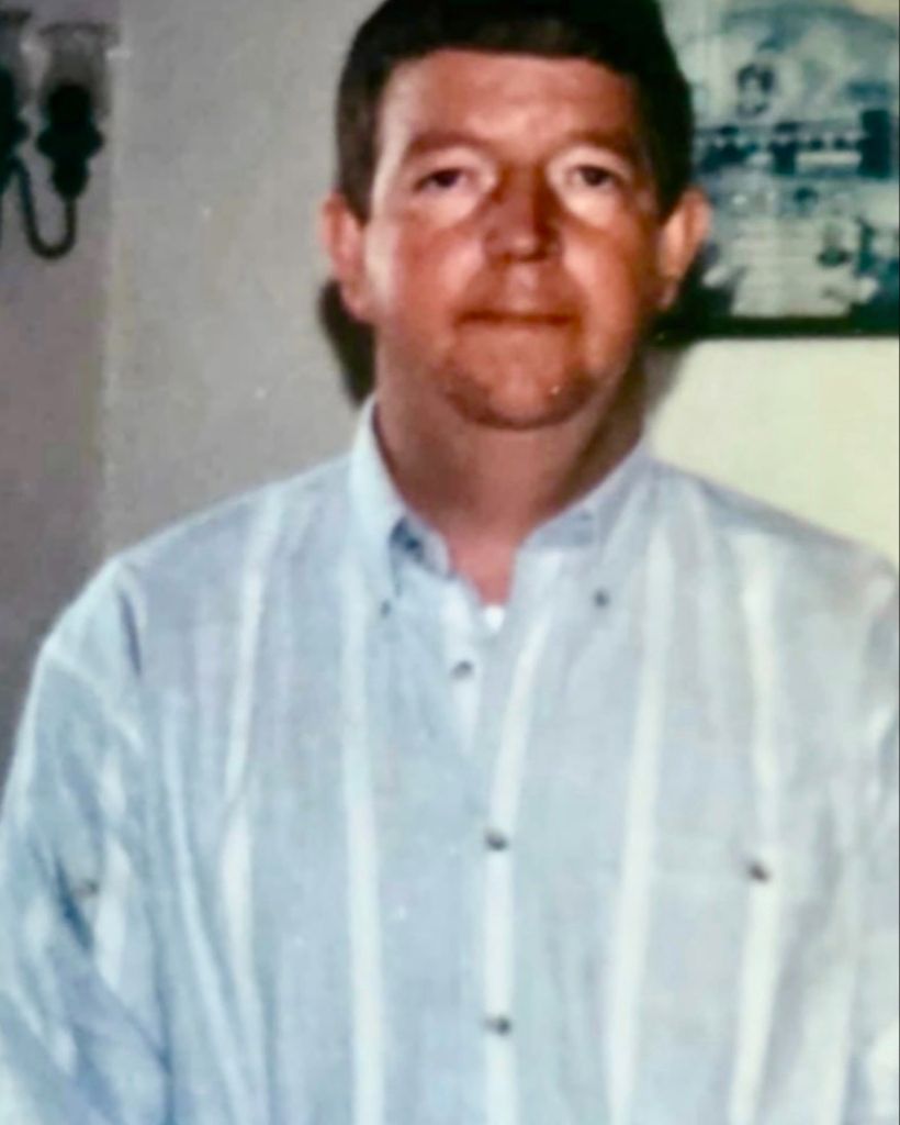 John E. Nibert