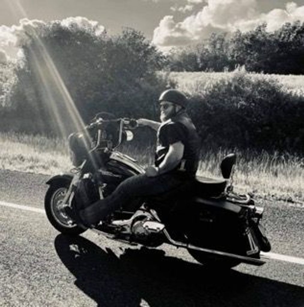 Christopher J. Simmons