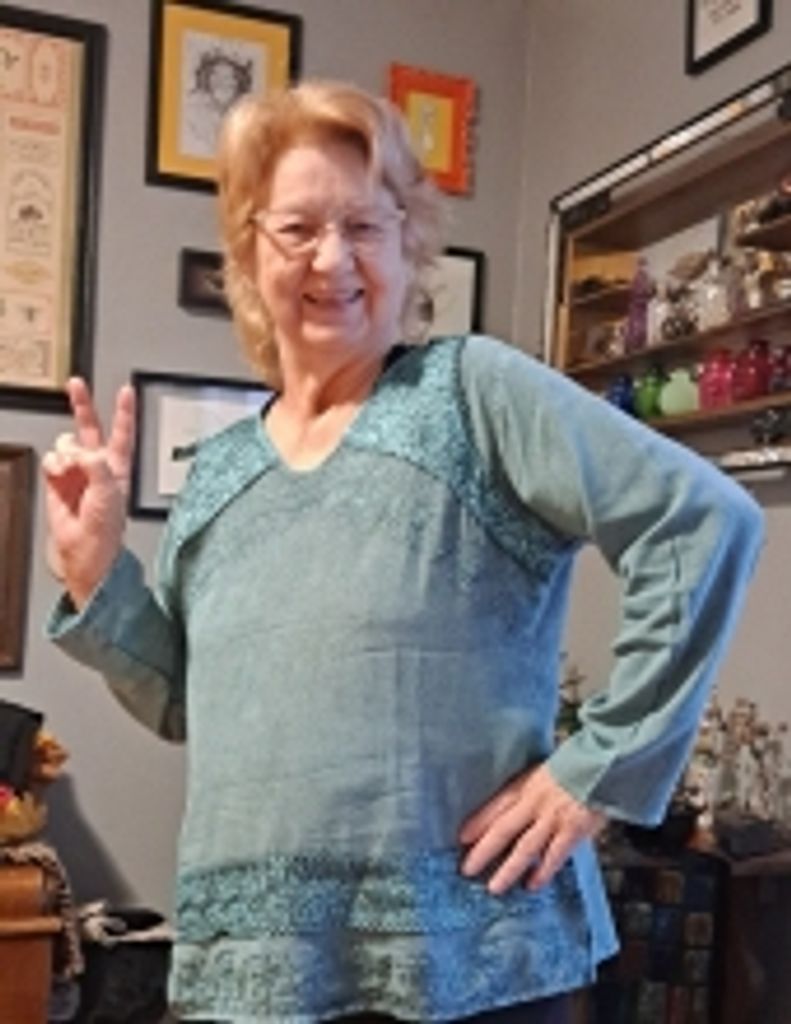 Lori "Lola" Mansour