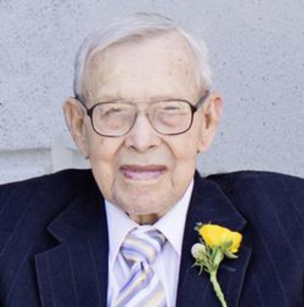 Ralph E Olson