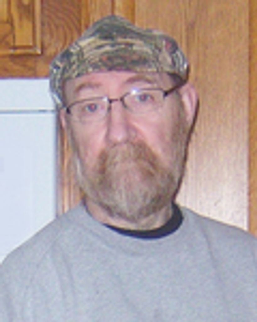 Mark E. Hartman