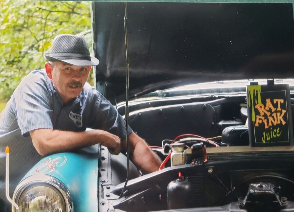 G. John "Tizzy" Tiziani