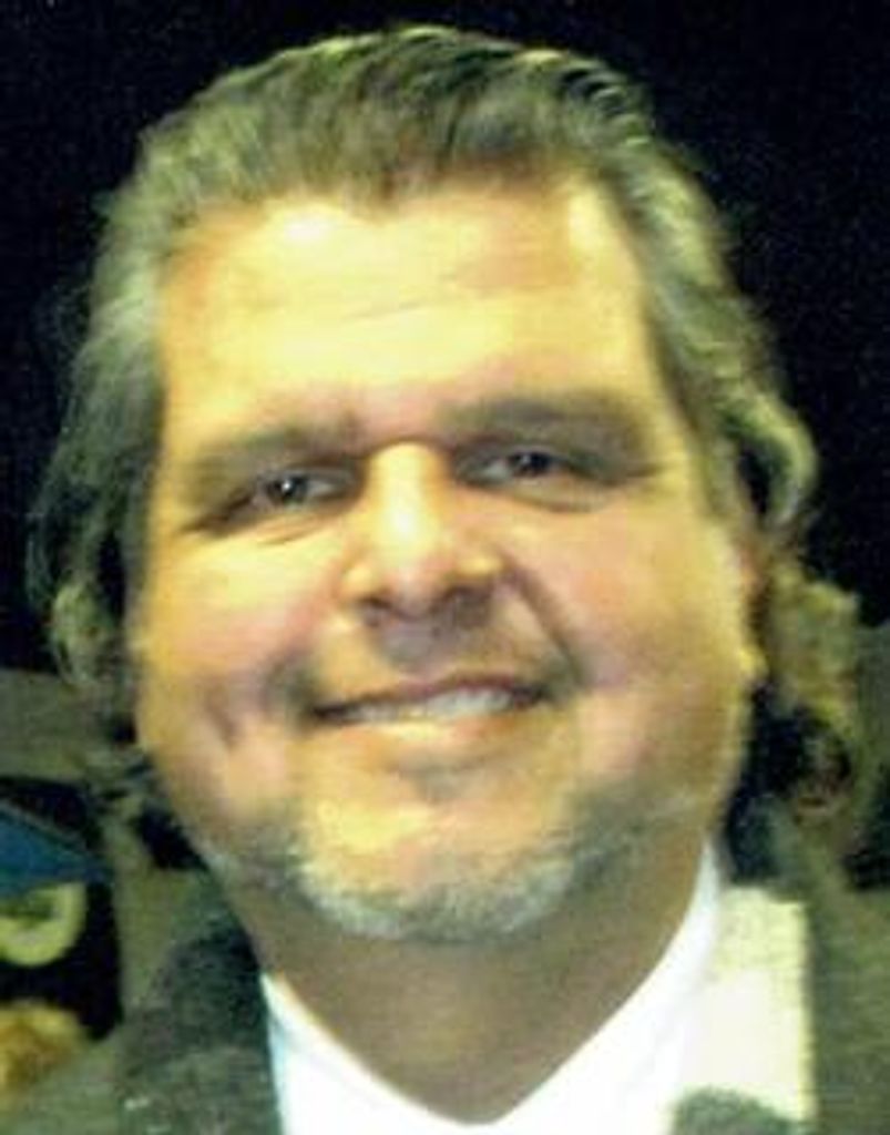 Michael "Mike" E. Calvillo