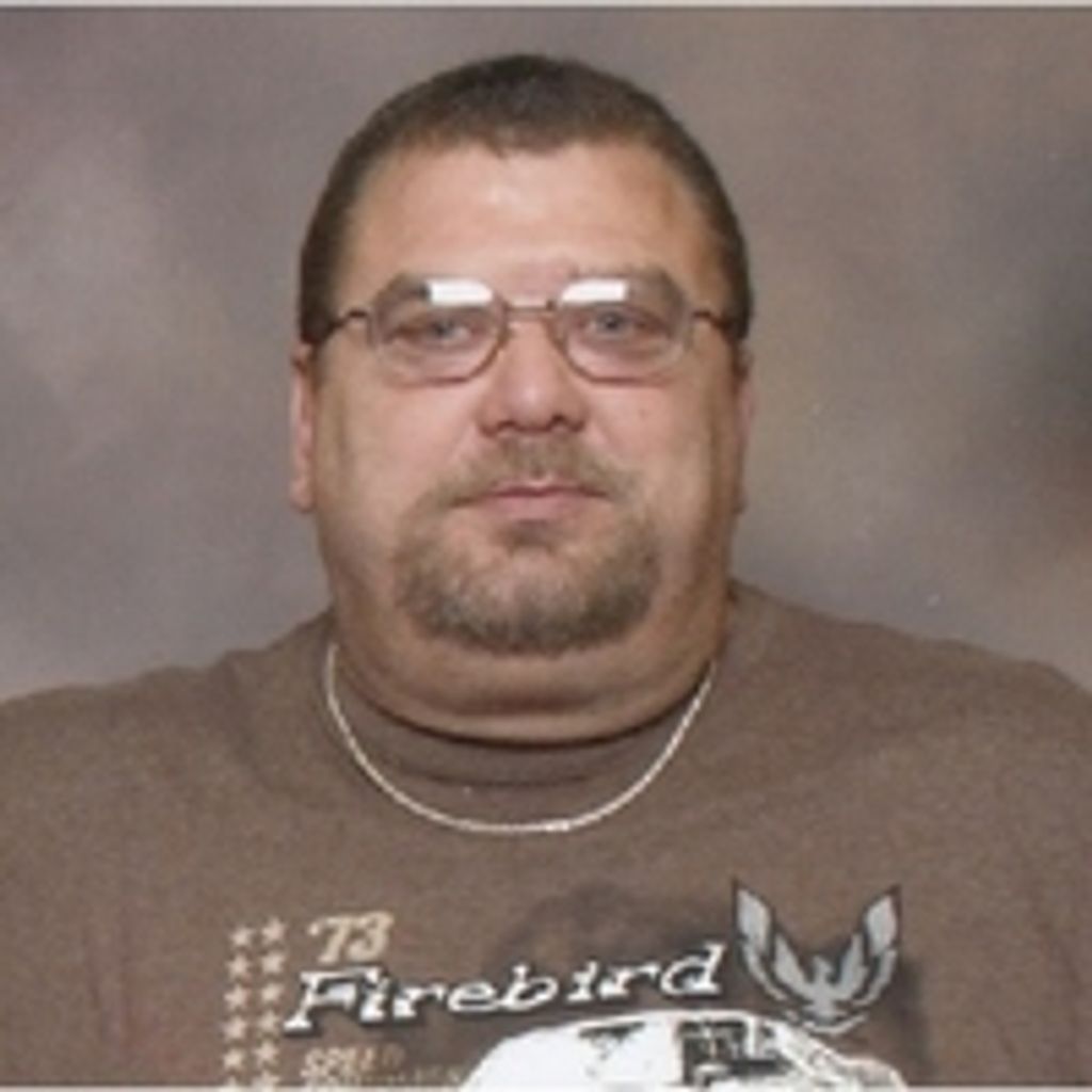 John E. Tillman