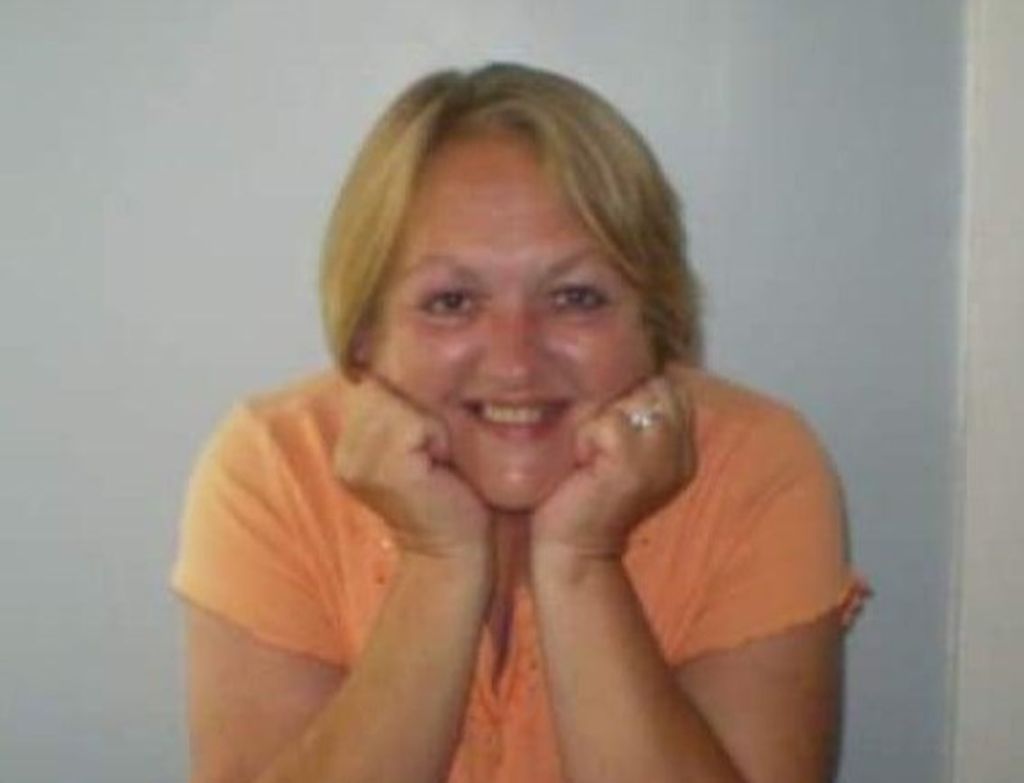 Debra "Debbie" E. Flanagan