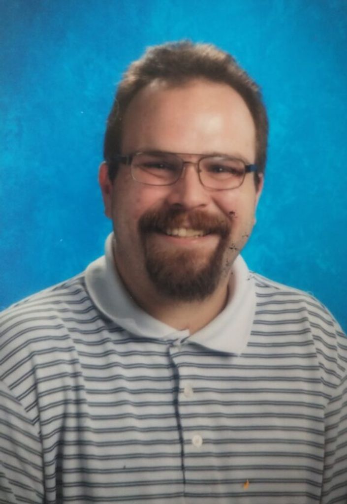 Nicholas E. “Nick” Strauser