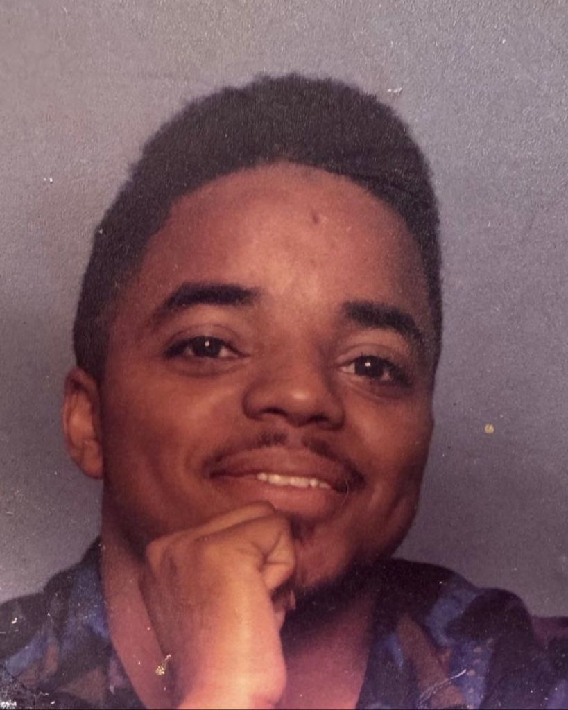 Andre Eugene Holman Profile Photo