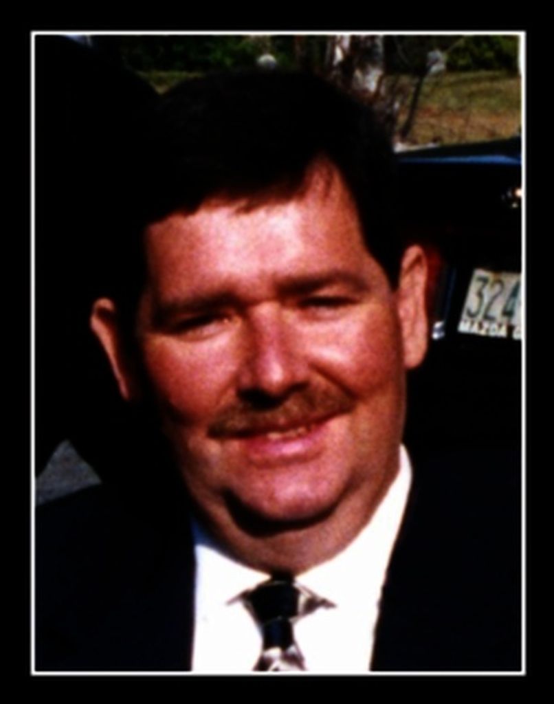 Thomas L. Tracy