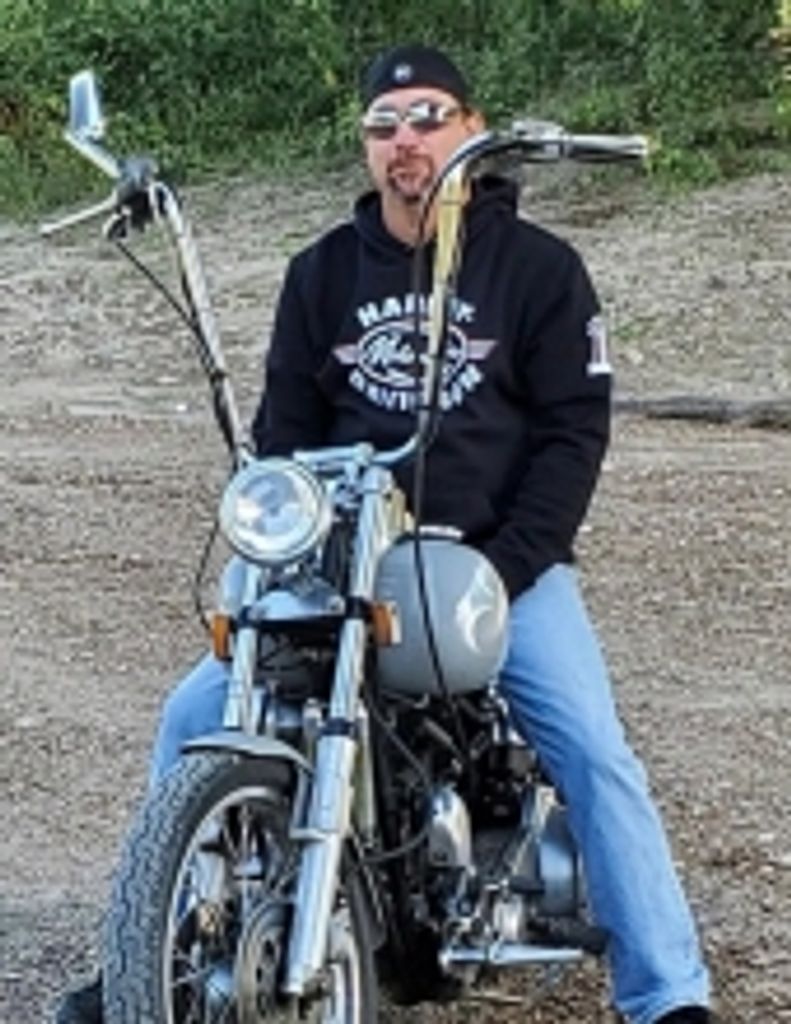 Ryan  Matthew Holcomb