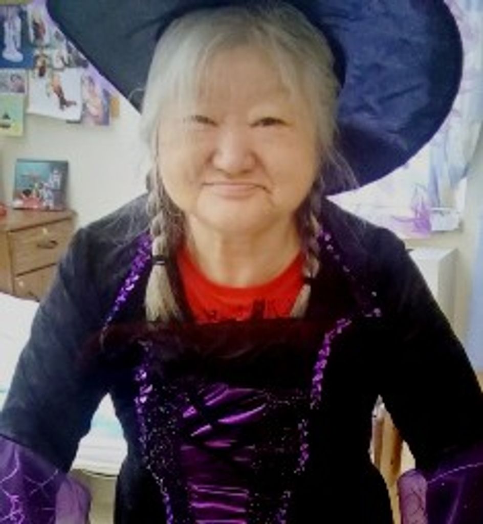Kyong Hwa "Elly" Armstrong