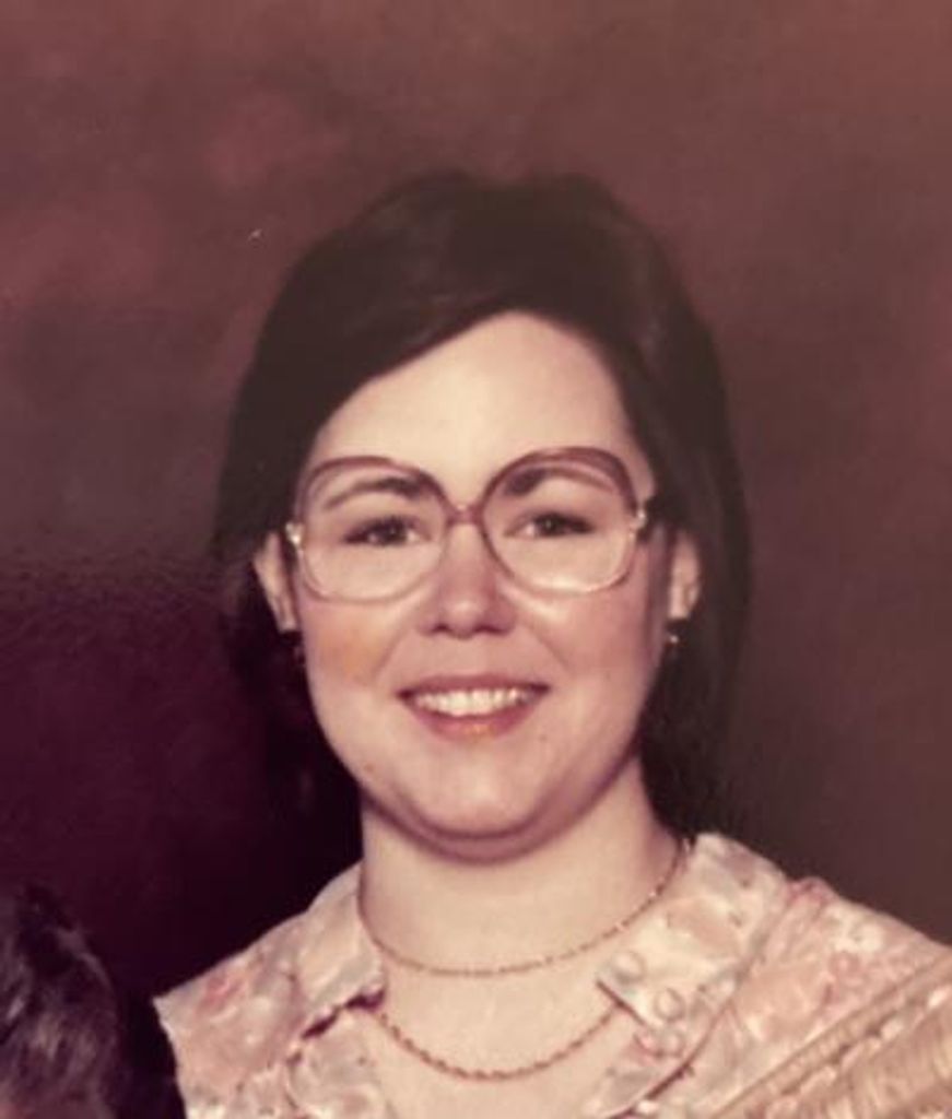 Susan M Curran