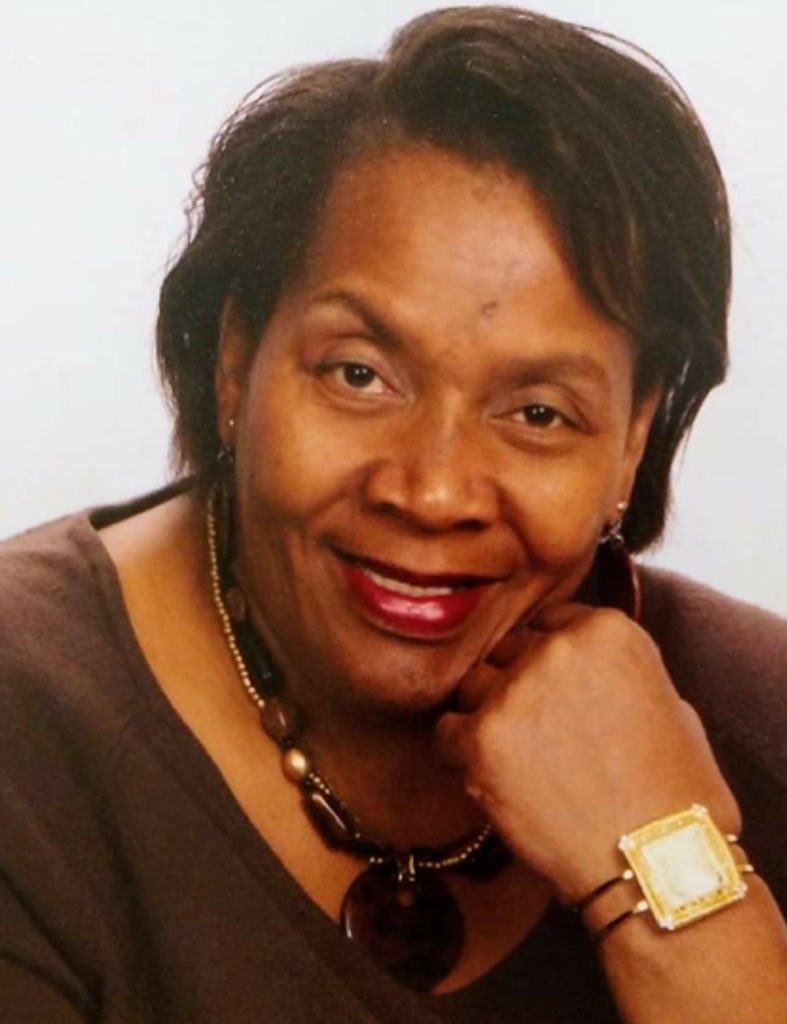 Estella G Moore