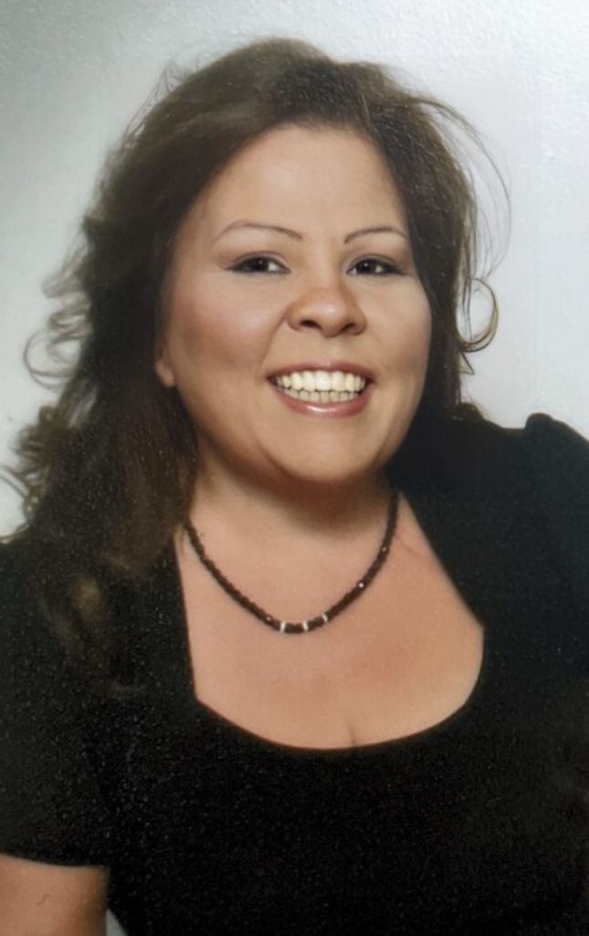 Jeanine "Nene" Maria Holmes