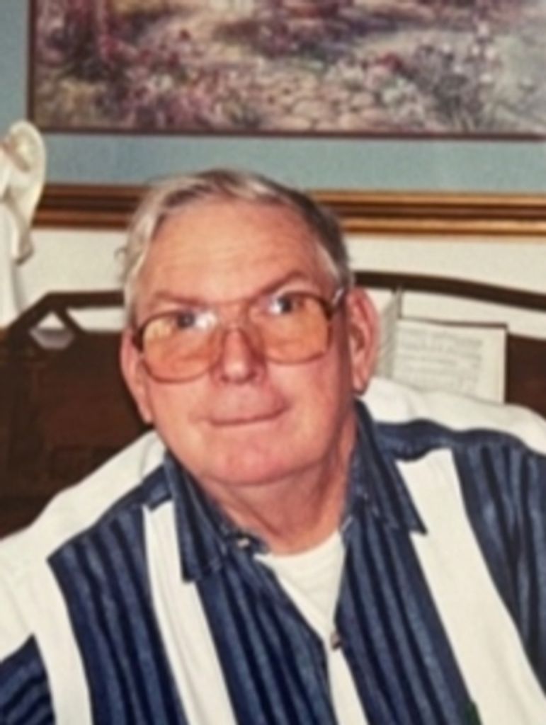 Carl E Oakes