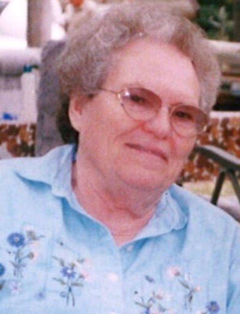 Carmil "Candy" E. White