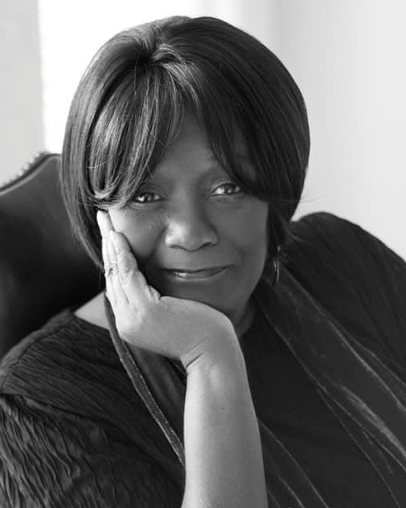 Ruth E. Sloane-Dew