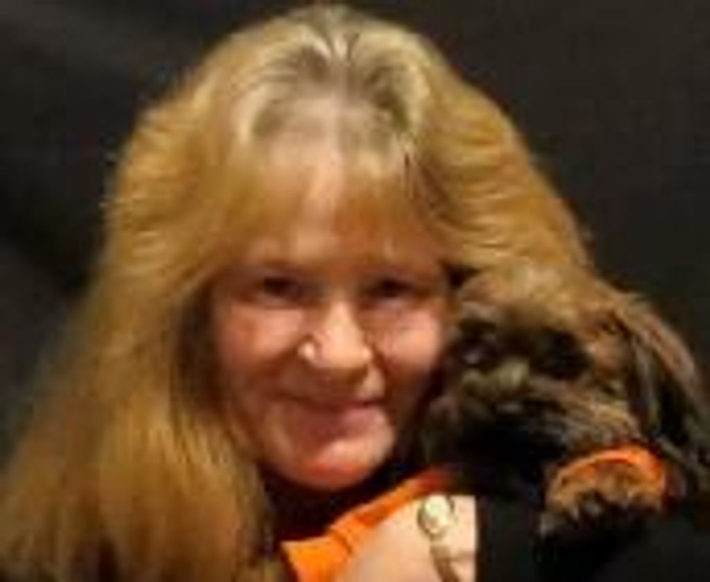 Tinia M. Dennison