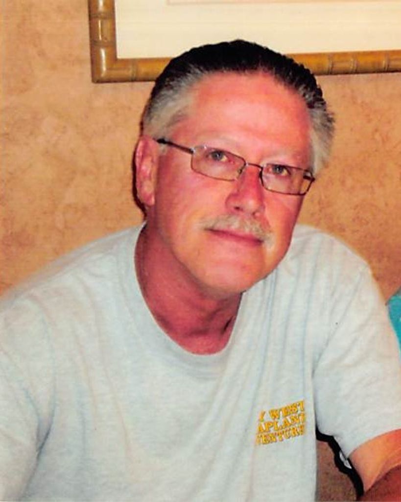 Mark E. Lewis