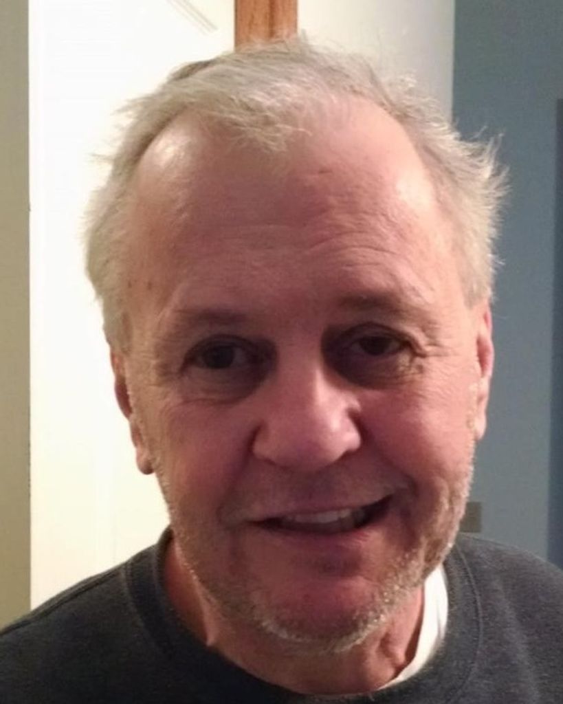 John T. "Tim" Kuk