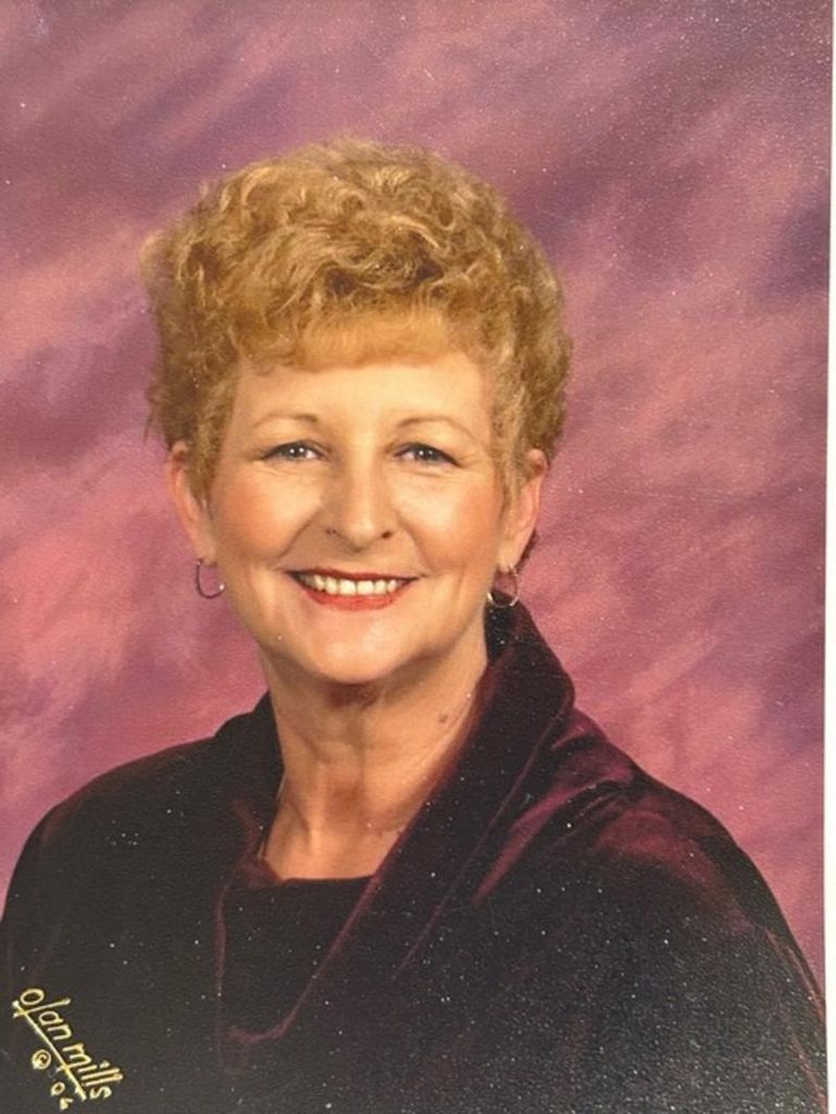 Claudine M. Locati