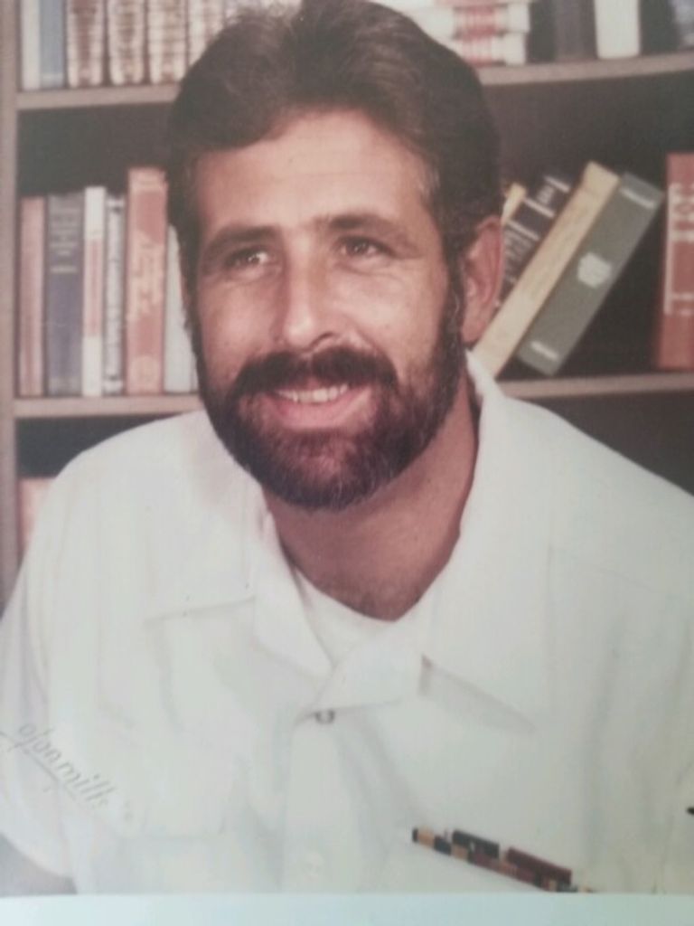 Bruce J Greely