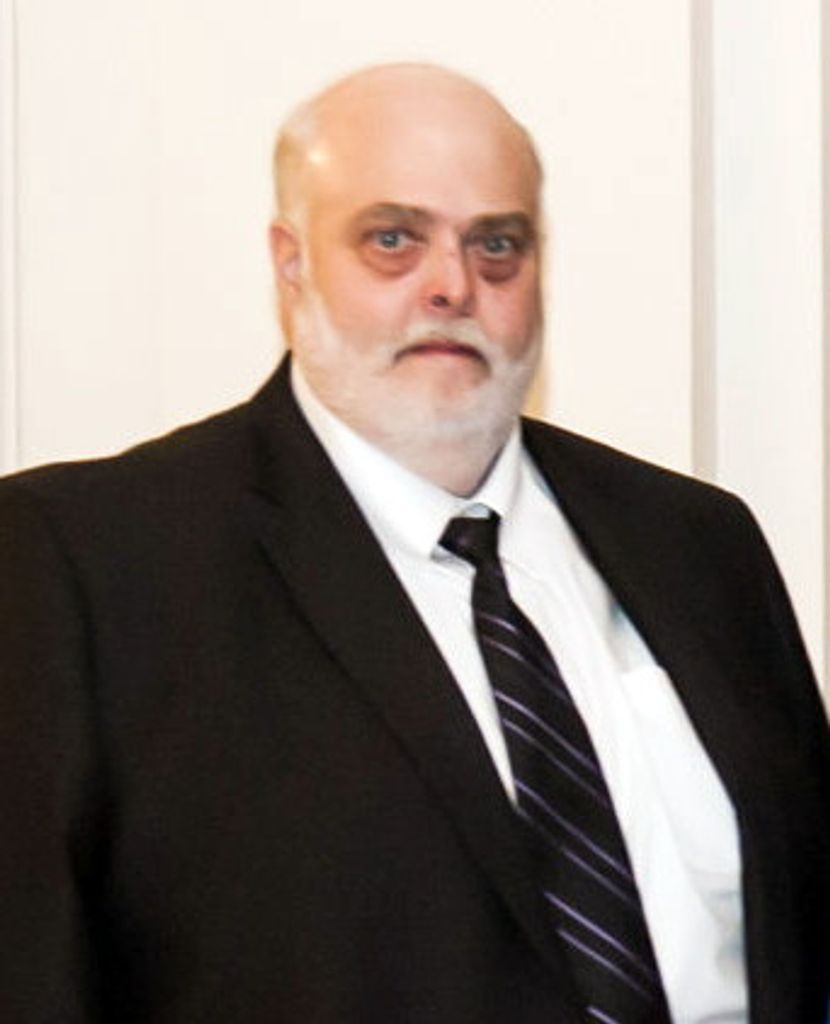 Michael E. Thatcher