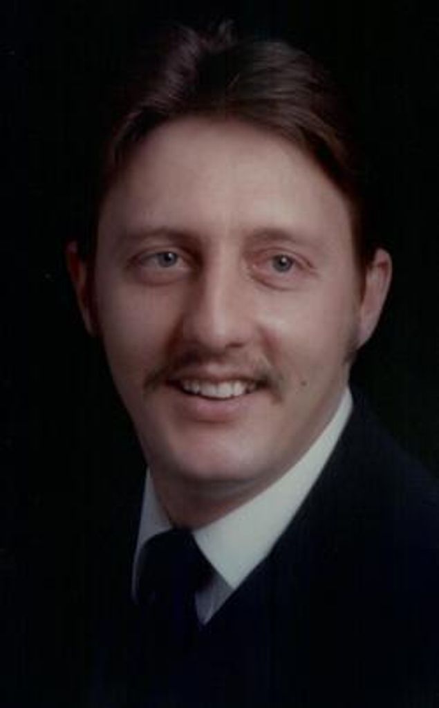 Roger E. Shykes