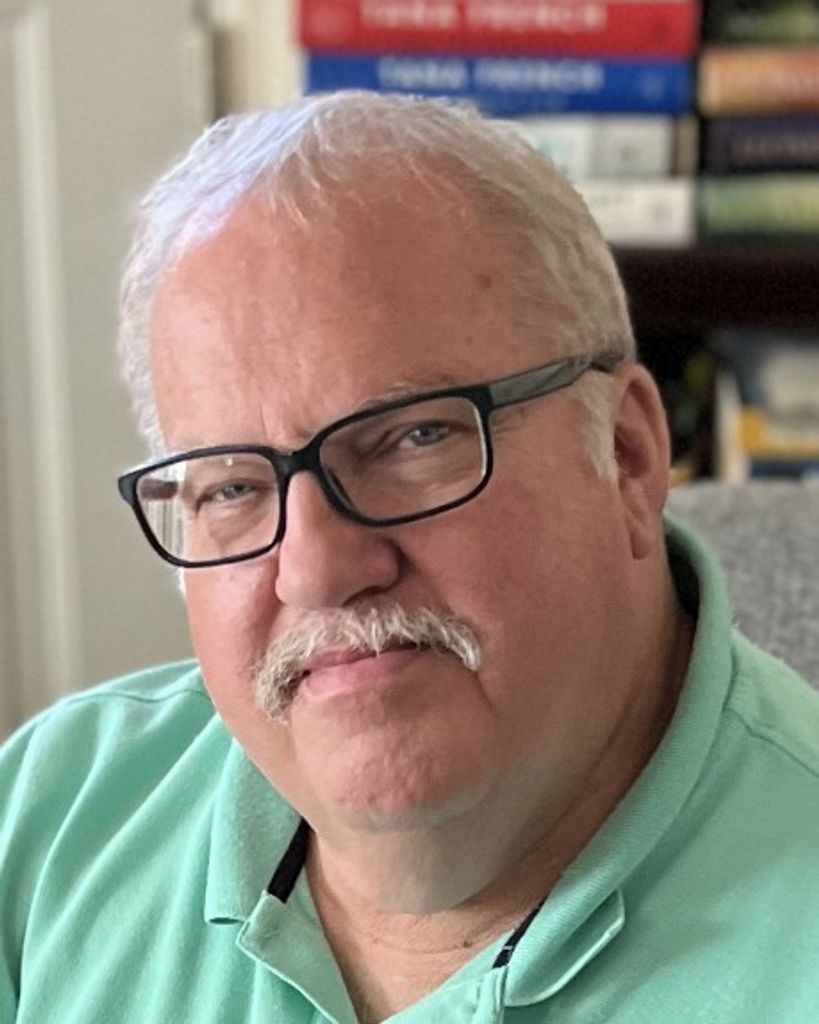 Roger L Caine