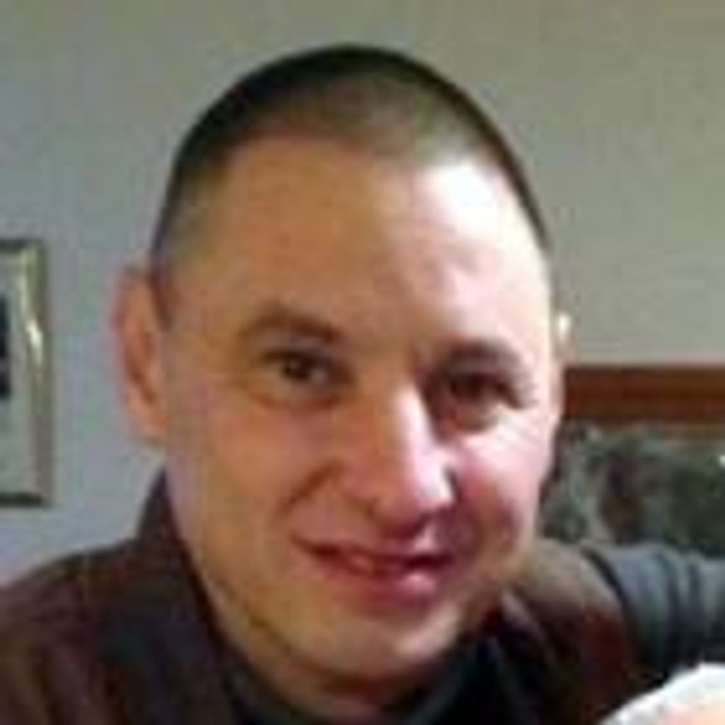 John W. "Caps" Ahladis