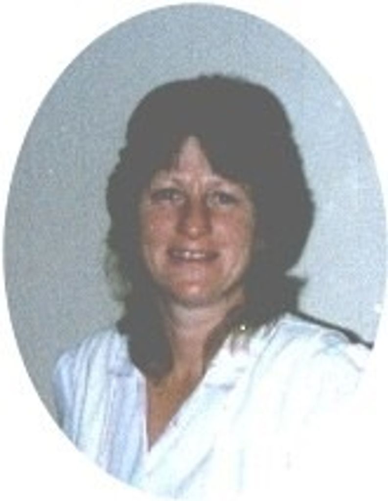 Debra J.  "Debbie" Tom