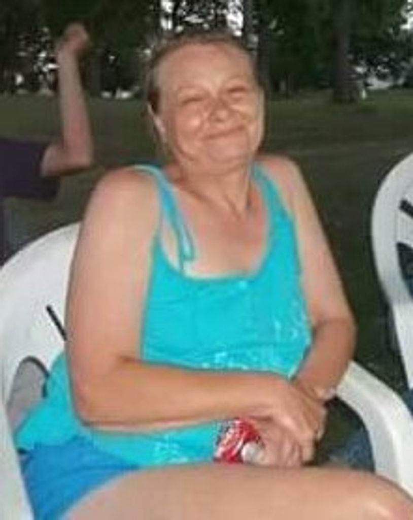 Julie G. TRAVIS