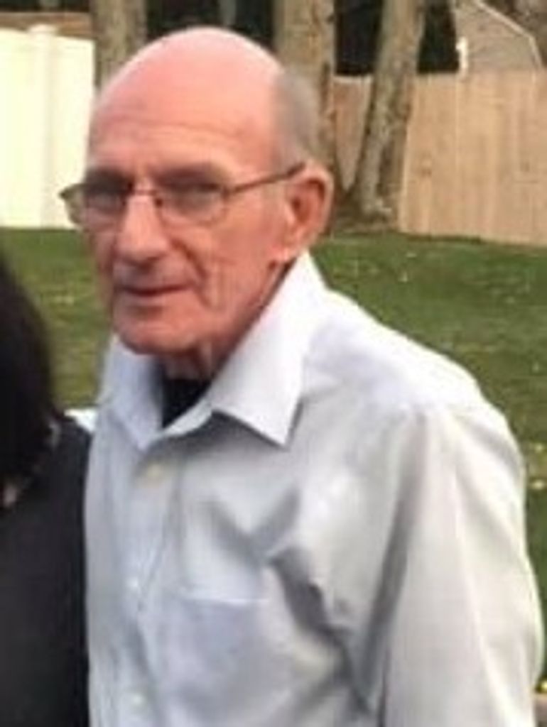 John T. Scansarole