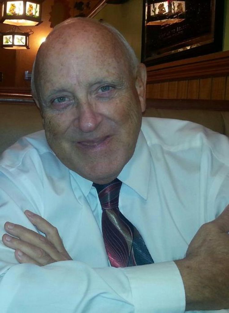 Louis "Lou" C. Rastetter, Jr.