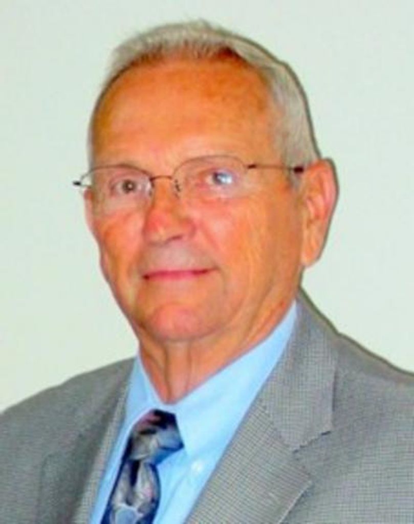 Richard C. "Dick"` Worland