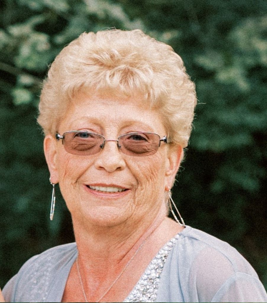 Margaret E. "Marge" Sing