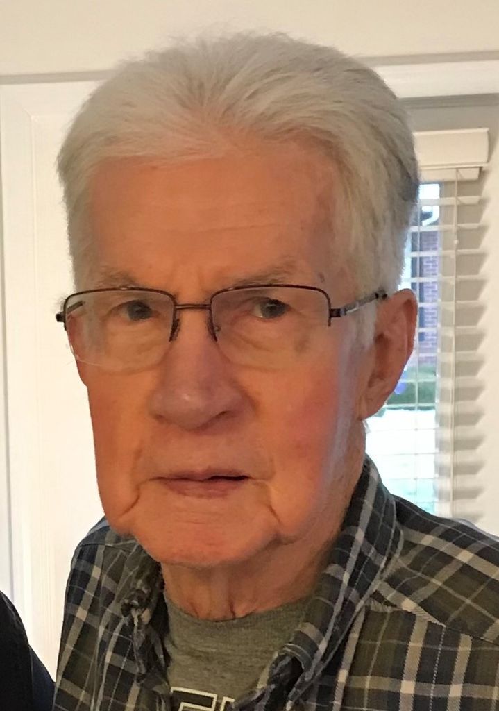 C. Raymond Mikels