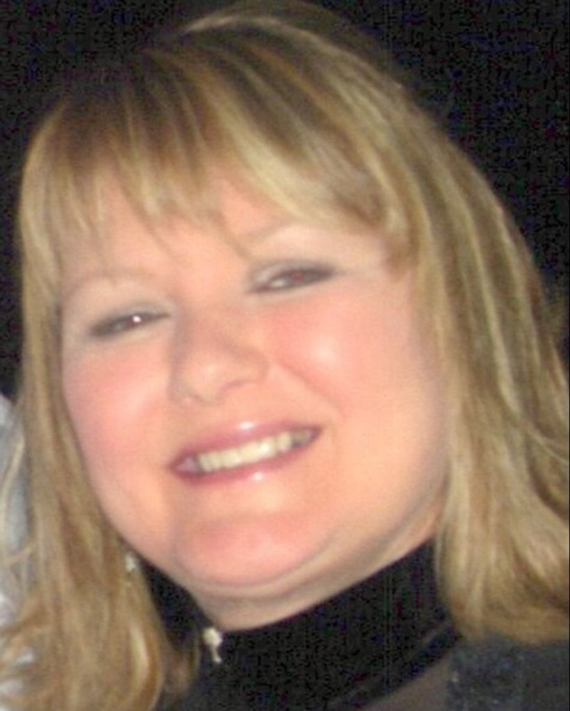 Cynthia "Cyndi" White