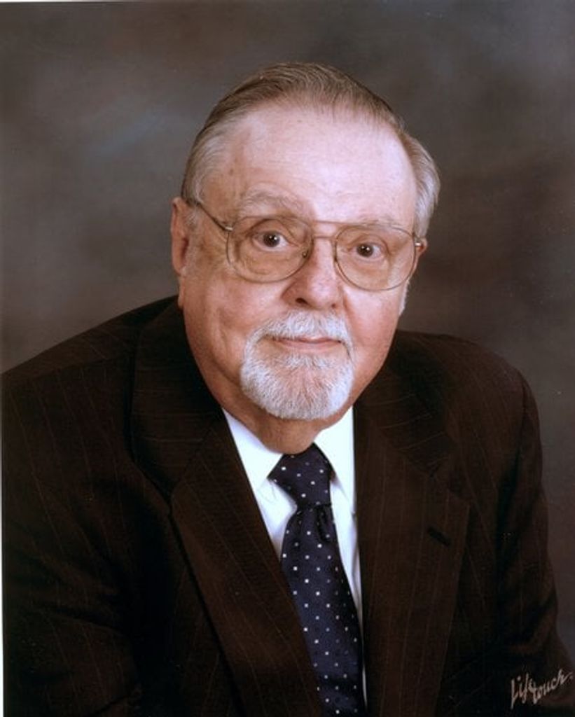 John E. Kochenburger