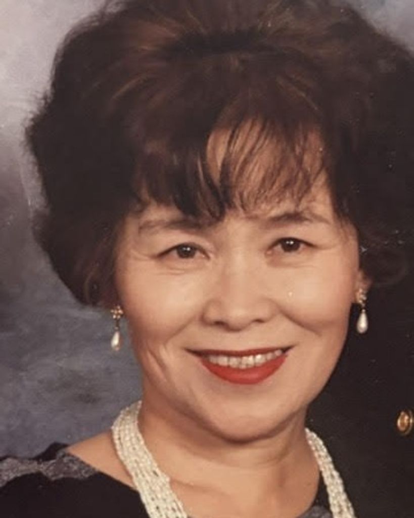 Michiko "Miko" Tanaka Nicholas