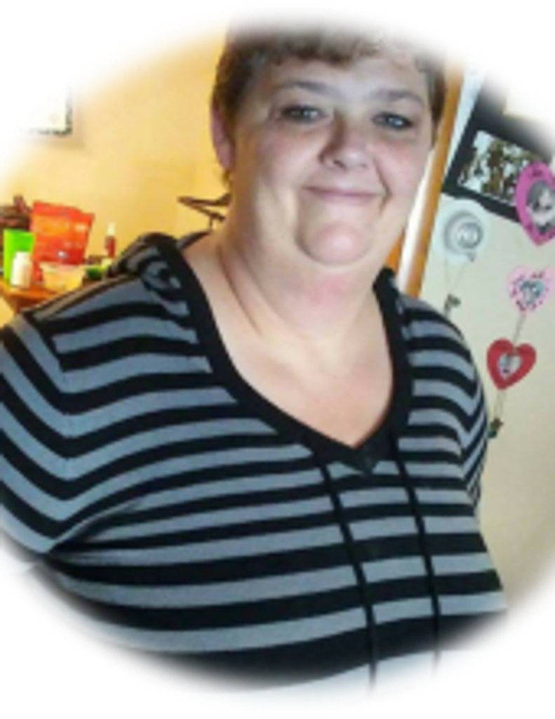 Nancy L. Woodward Booth