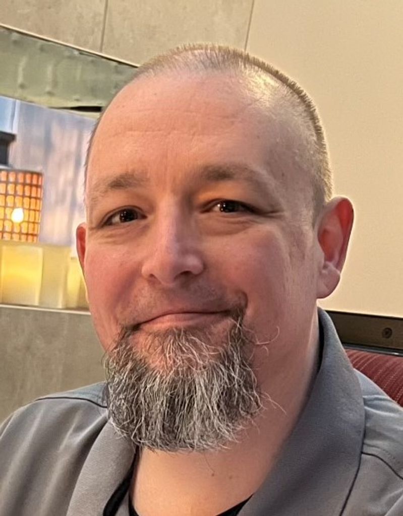 Thomas "Tom" David Burkett