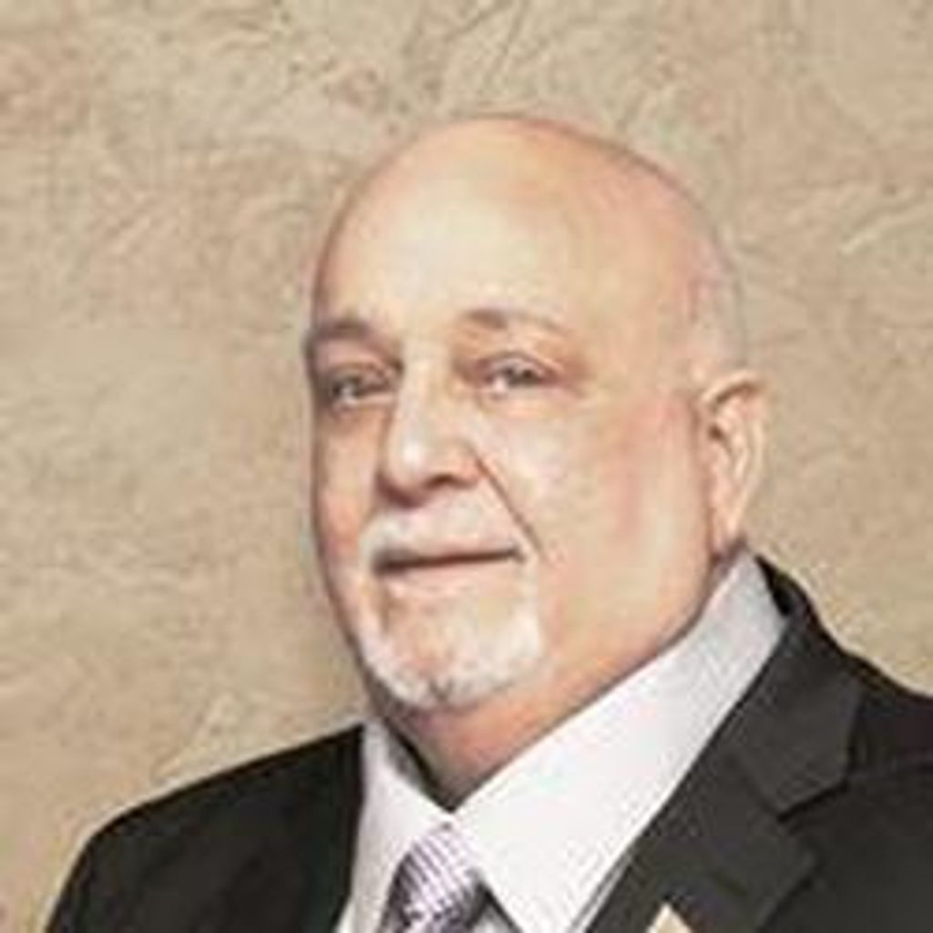 J. John "J.J." Zurek
